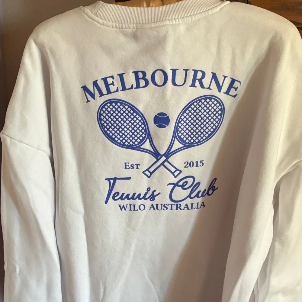 White Crewneck Sweatshirt with Small Lavender Tennis Chest Graphic